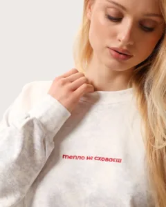 Unisex-Sweatshirt mit Thermoeffekt und Stickerei „Wärme kann man nicht verbergen“