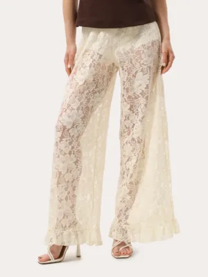 Cremefarbene Spitzenhose mit Rüschen